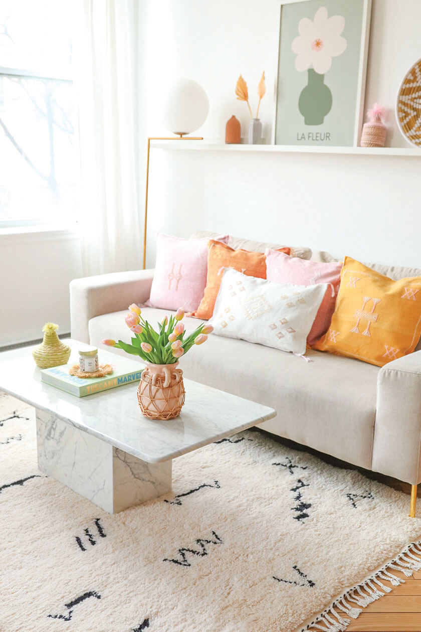 moroccan beni rugs from baba souk in pastel danish style living room with marble coffee table